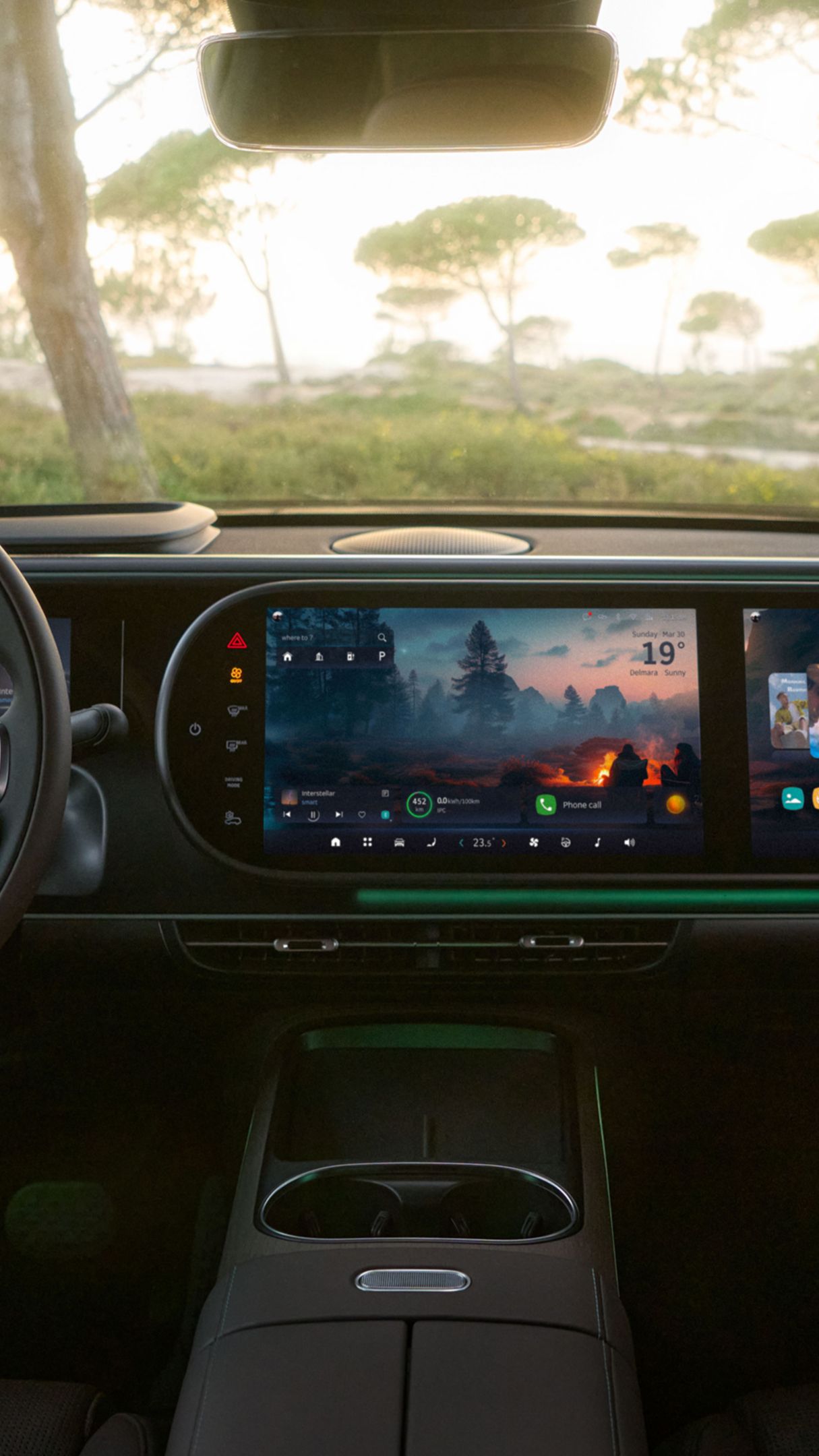 Interior shot of the cockpit of a smart #5; trees can be seen through the windshield.